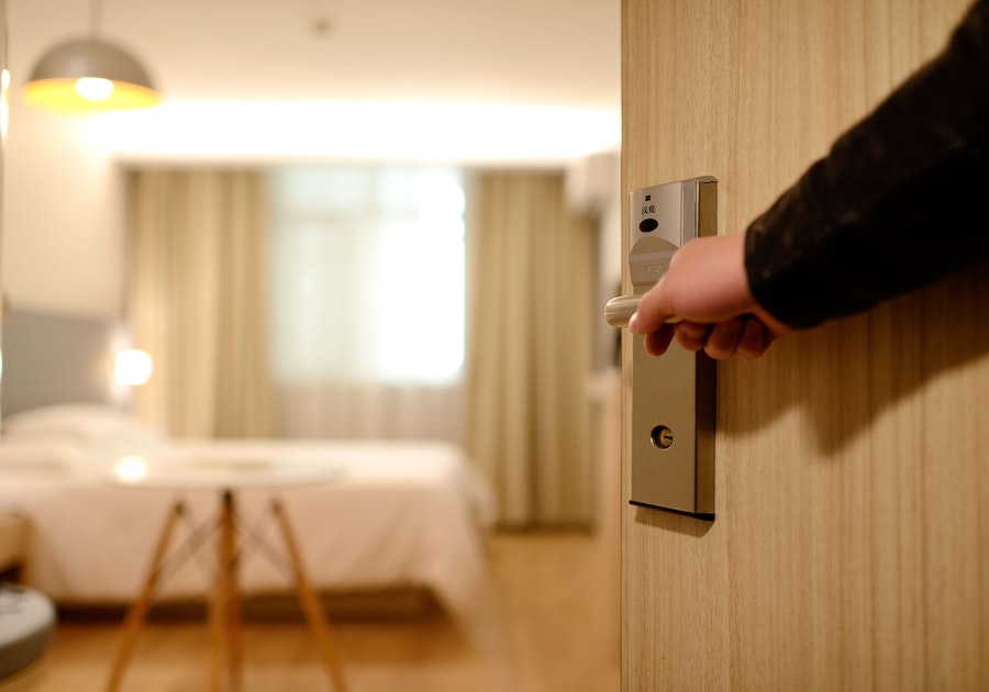 opening a hotel room door using a commercial lever.