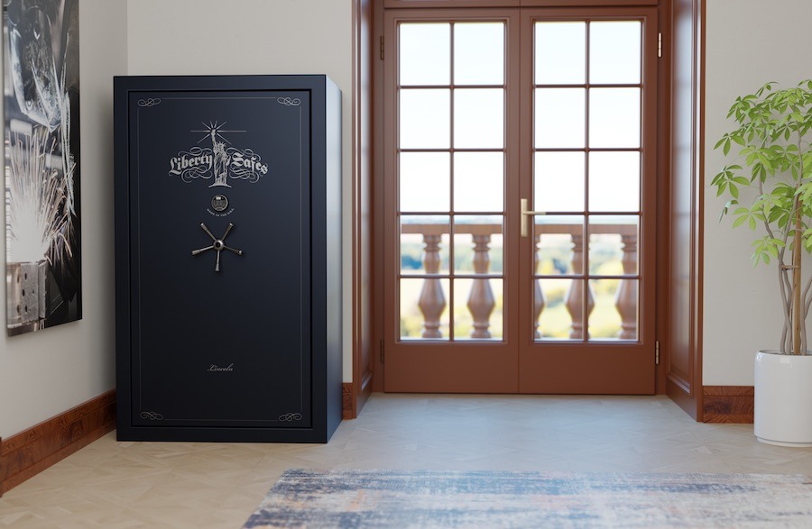 A large Liberty gun safe is installed next to a bedroom balcony’s French doors.
